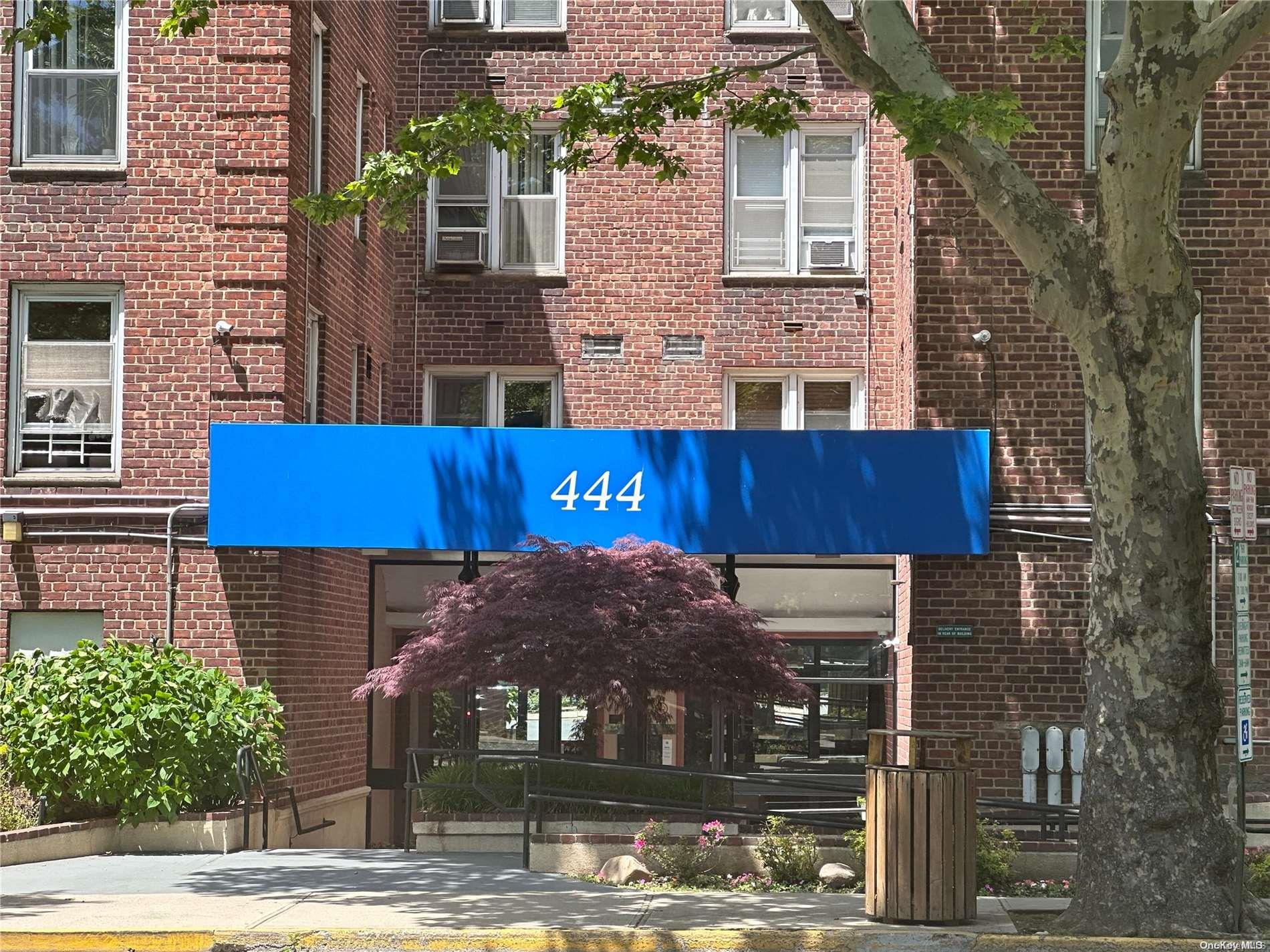 444 Middle Neck Road, Unit 3N Great Neck, NY 11023 - Photo 1 of 1 a front view of a house with street
