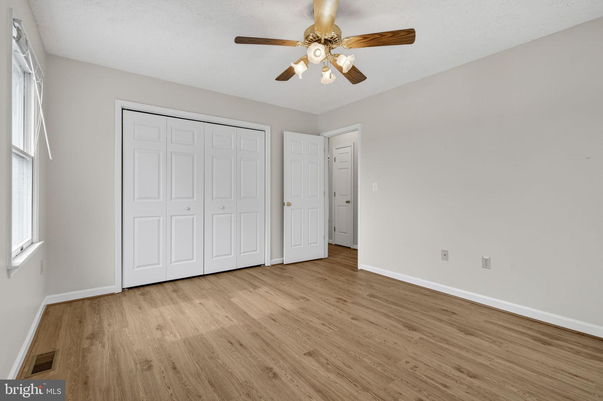 11576 Walters Road Orange, VA 22960 - Photo 35 of 61 a view of an empty room with wooden floor