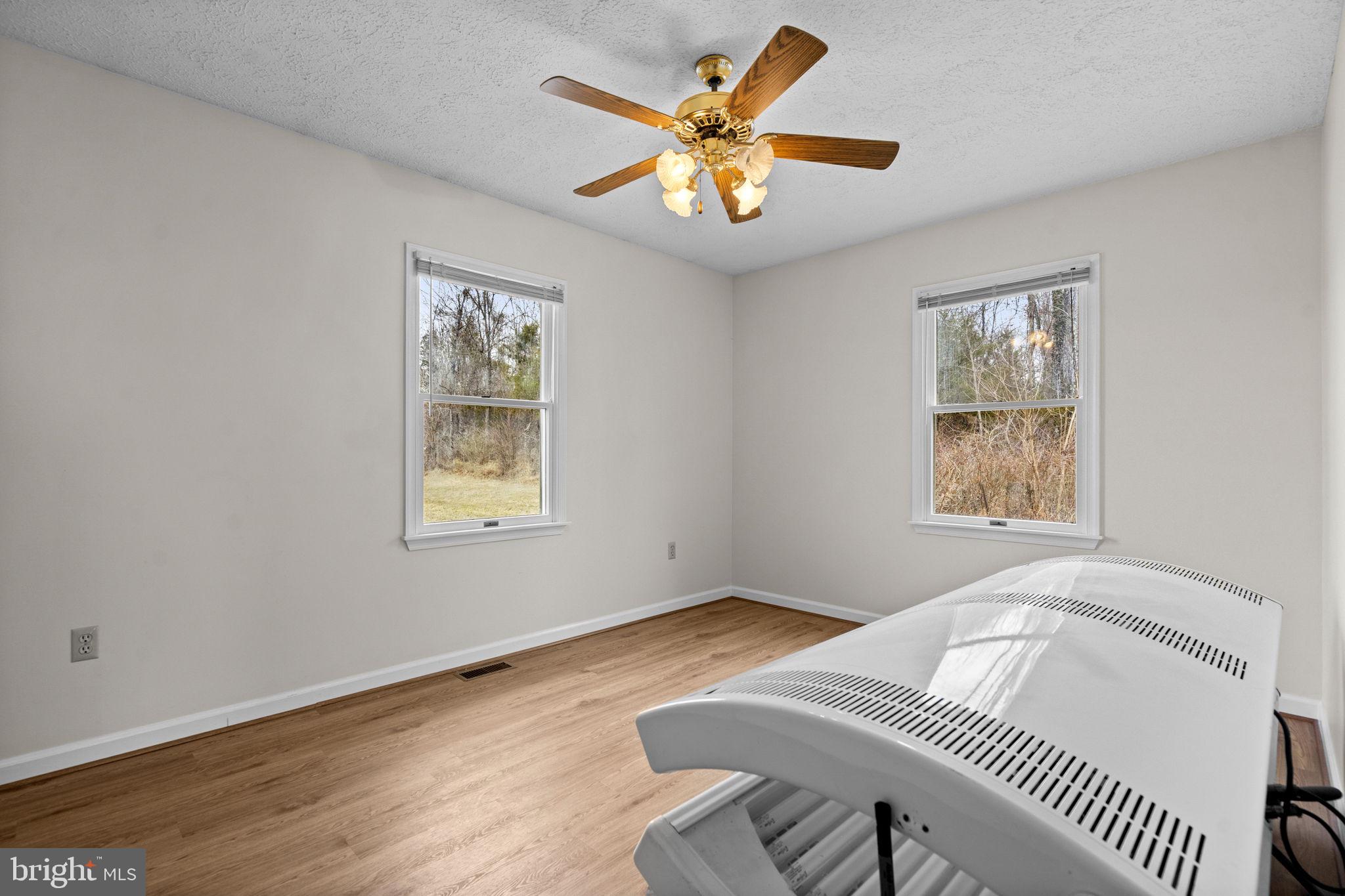 11576 Walters Road Orange, VA 22960 - Photo 37 of 61 a bedroom with a bed and a window