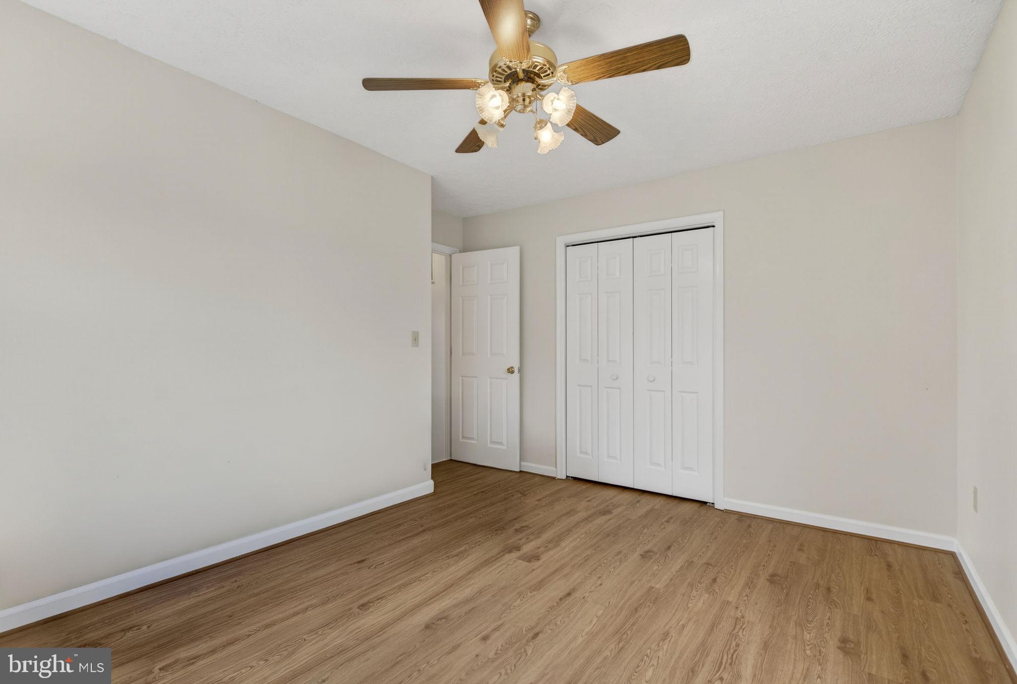11576 Walters Road Orange, VA 22960 - Photo 38 of 61 a view of an empty room with wooden floor