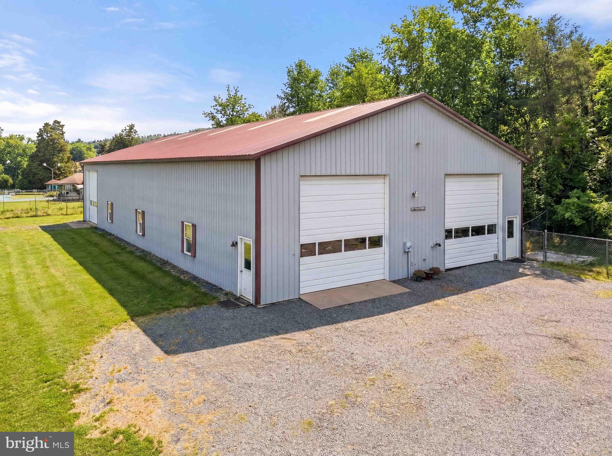 11576 Walters Road Orange, VA 22960 - Photo 39 of 61 a front view of house with yard and trees in the background