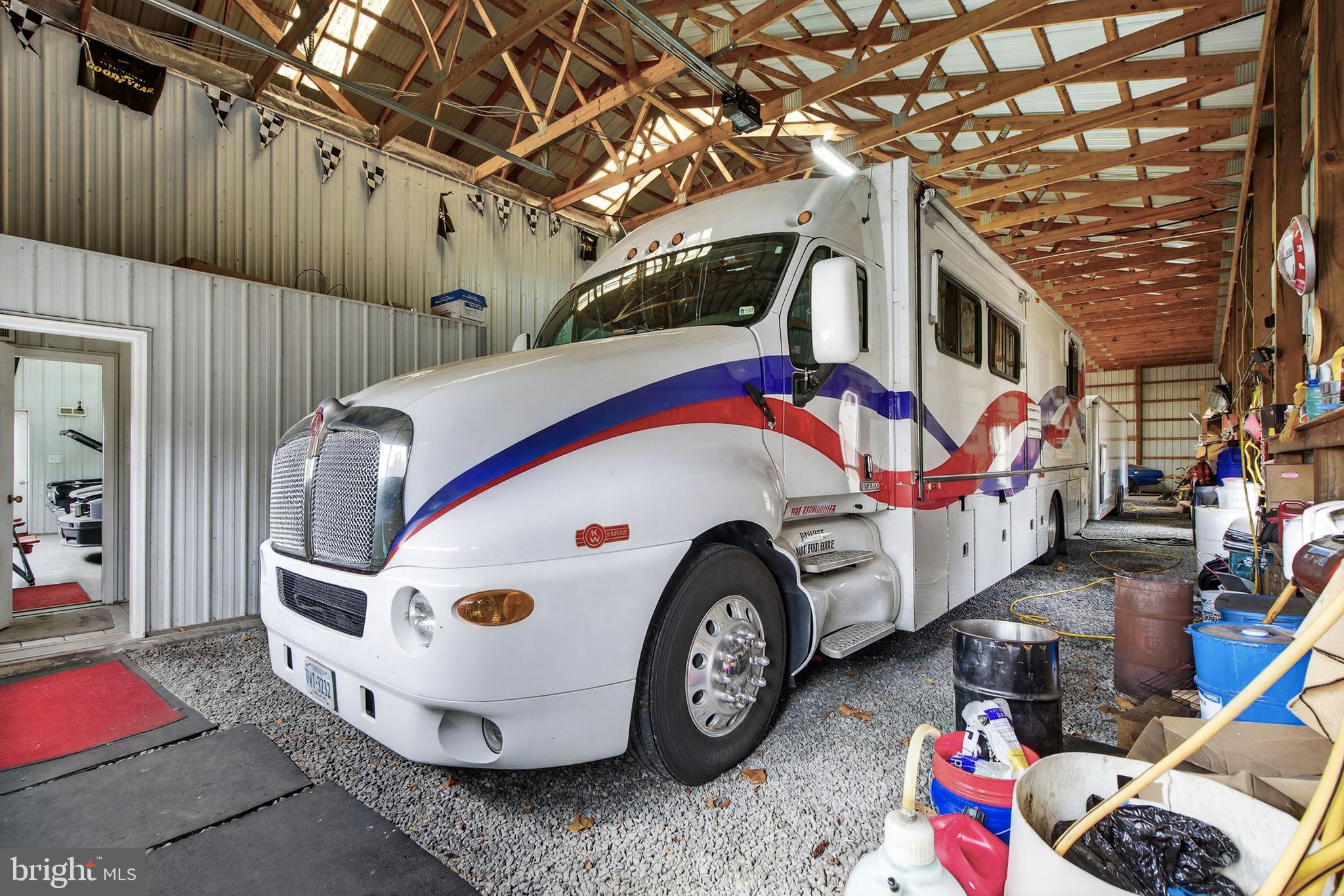 11576 Walters Road Orange, VA 22960 - Photo 43 of 61 a white car parked in front of a house
