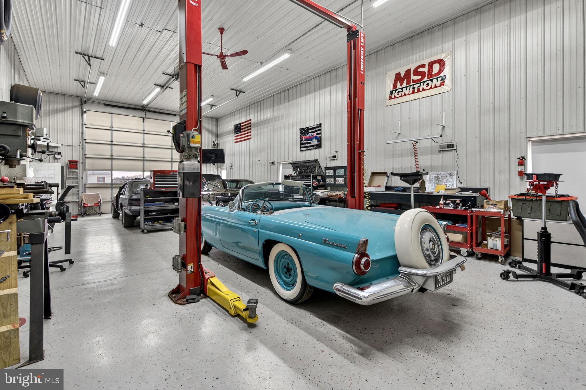 11576 Walters Road Orange, VA 22960 - Photo 46 of 61 a view of parking garage with cars and other equipment