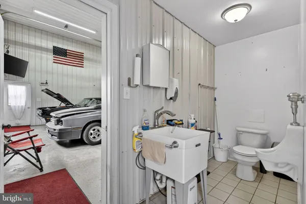 a view of a lake with houses in the background