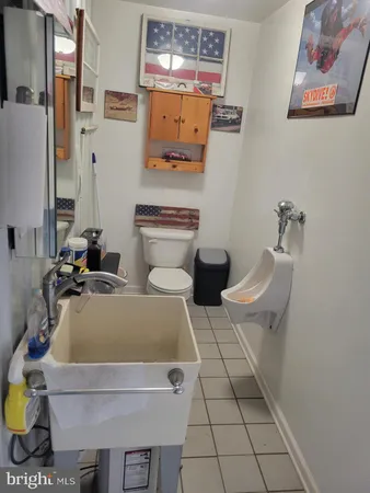 a aerial view of a house with outdoor space and ocean view