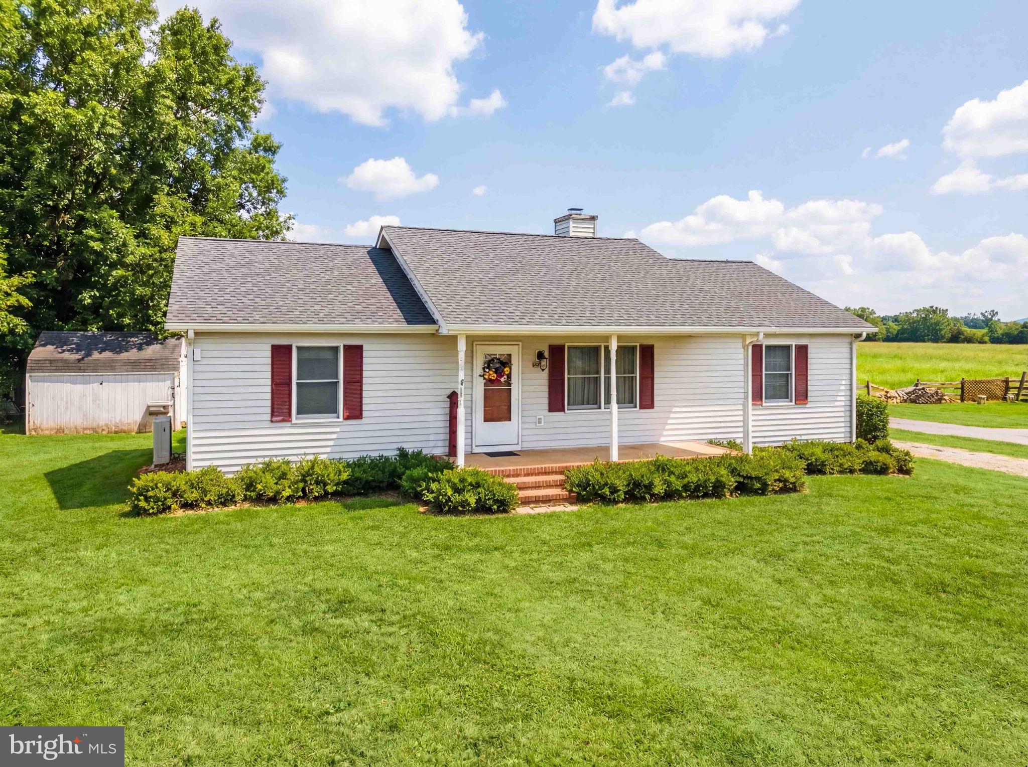 11576 Walters Road Orange, VA 22960 - Photo 8 of 61 a front view of a house with a garden