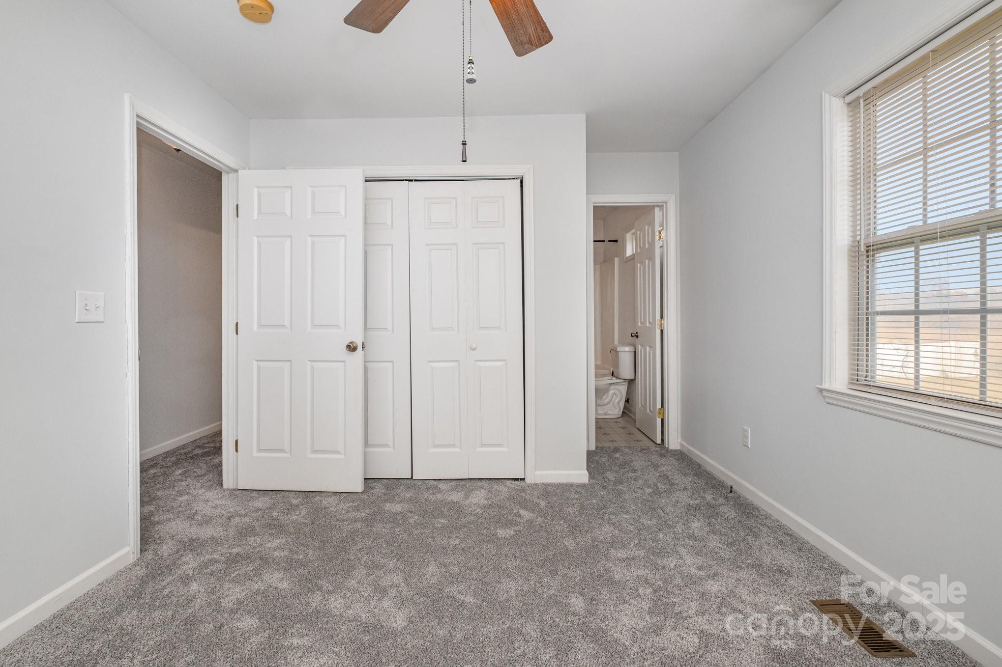 4980 Forest Ridge Drive Hickory, NC 28602 - Photo 19 of 35 an empty room with windows and closet