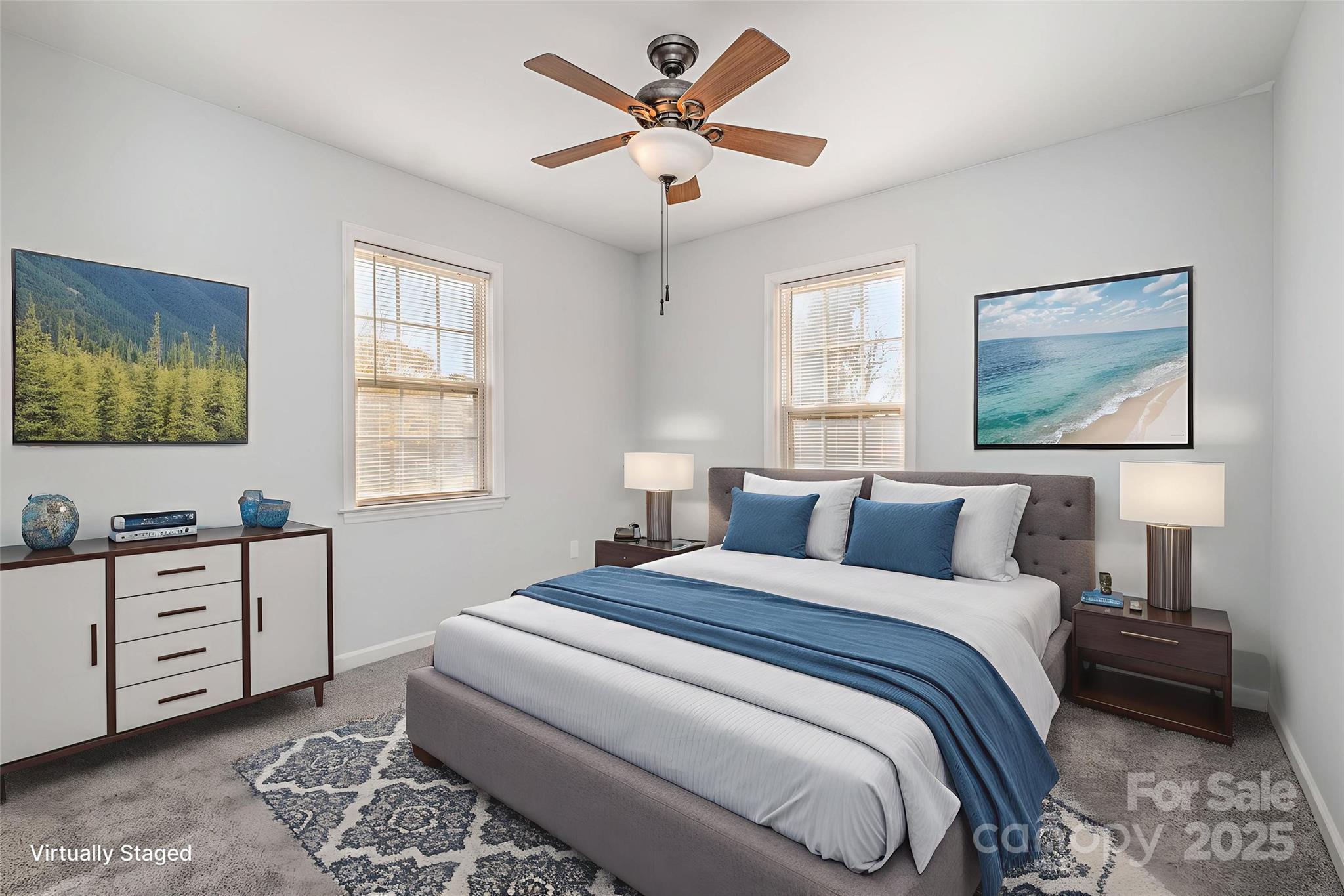 4980 Forest Ridge Drive Hickory, NC 28602 - Photo 21 of 35 a bedroom with a bed and a chandelier