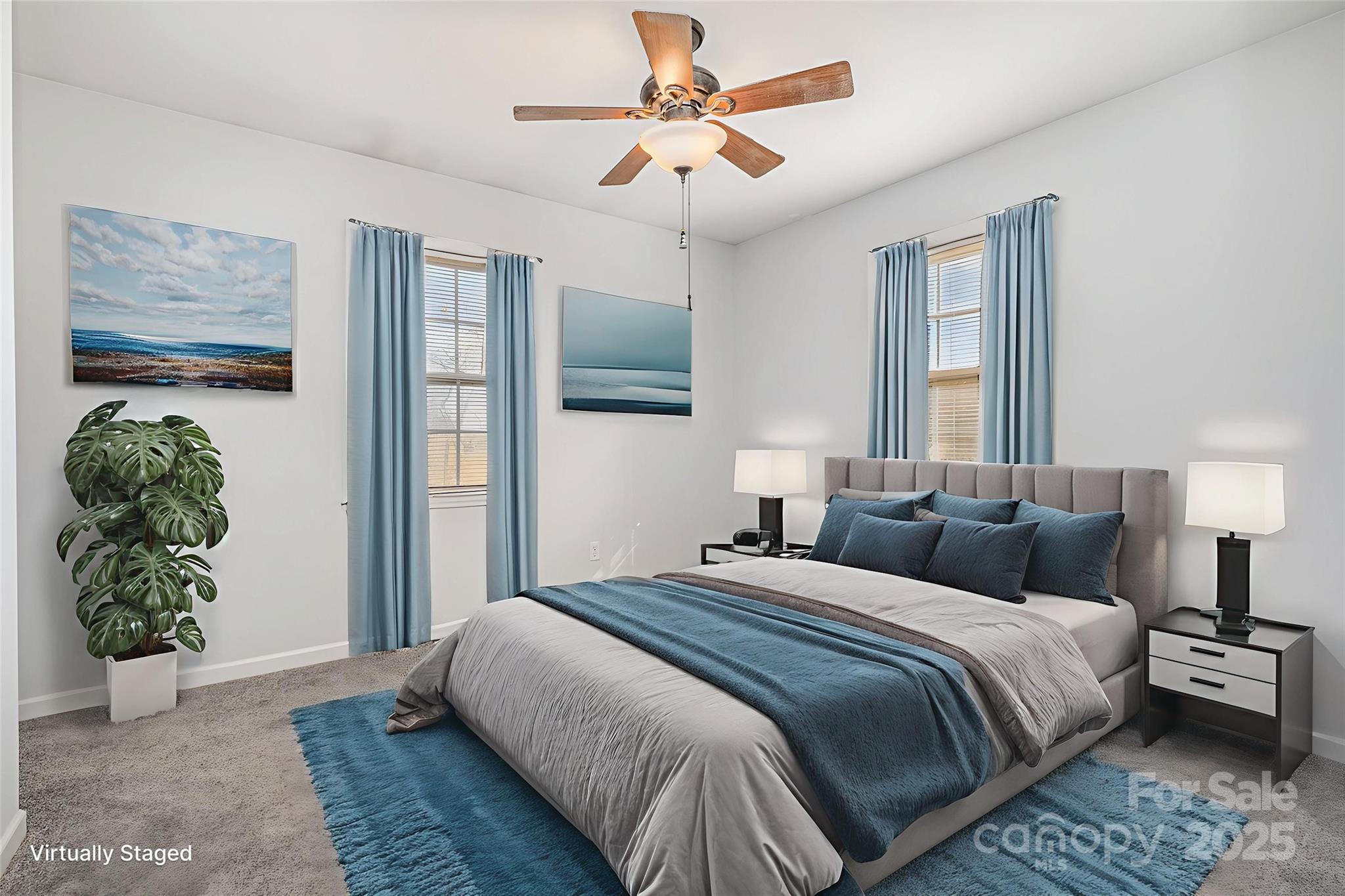 4980 Forest Ridge Drive Hickory, NC 28602 - Photo 23 of 35 a bedroom with a bed a dresser and potted plant