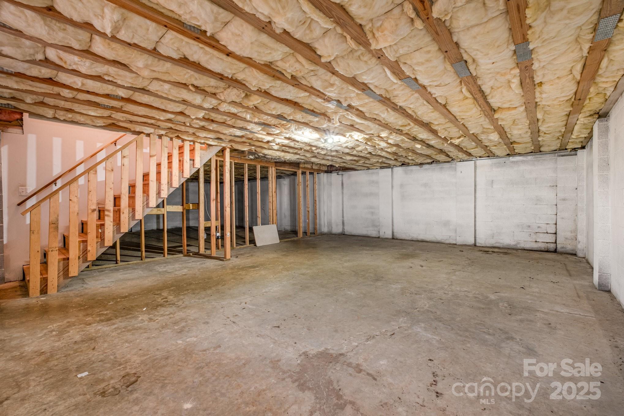 4980 Forest Ridge Drive Hickory, NC 28602 - Photo 28 of 35 a view of an empty room with stairs