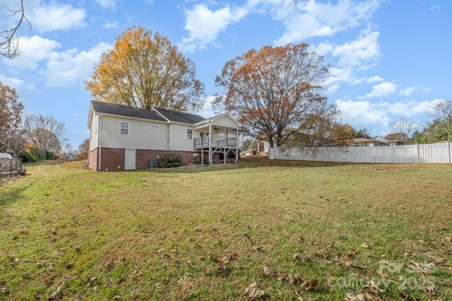 a view of a lake with a house in the background