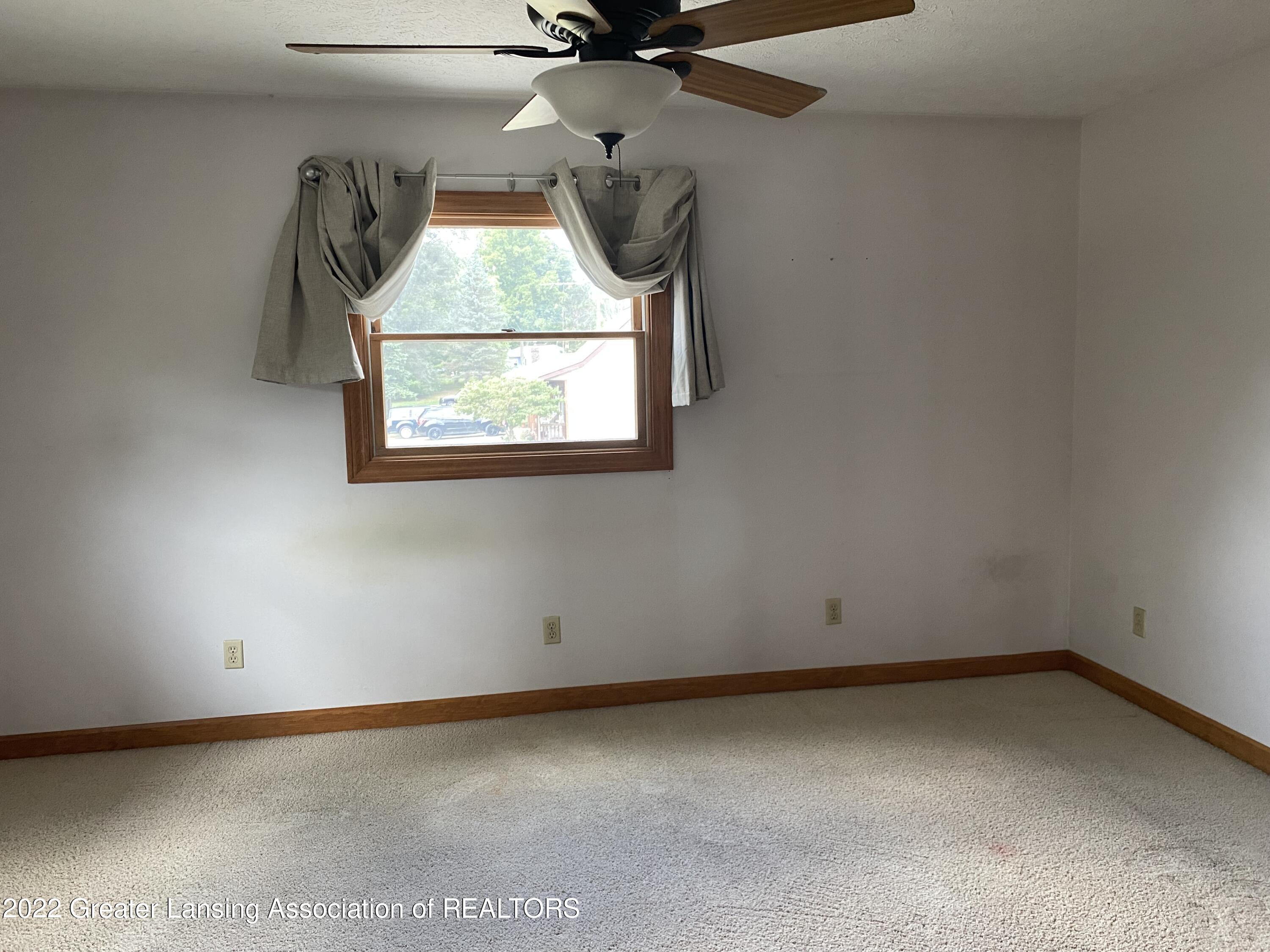 9136 Coleman Road Haslett, MI 48840 - Photo 12 of 34 Primary Bedroom