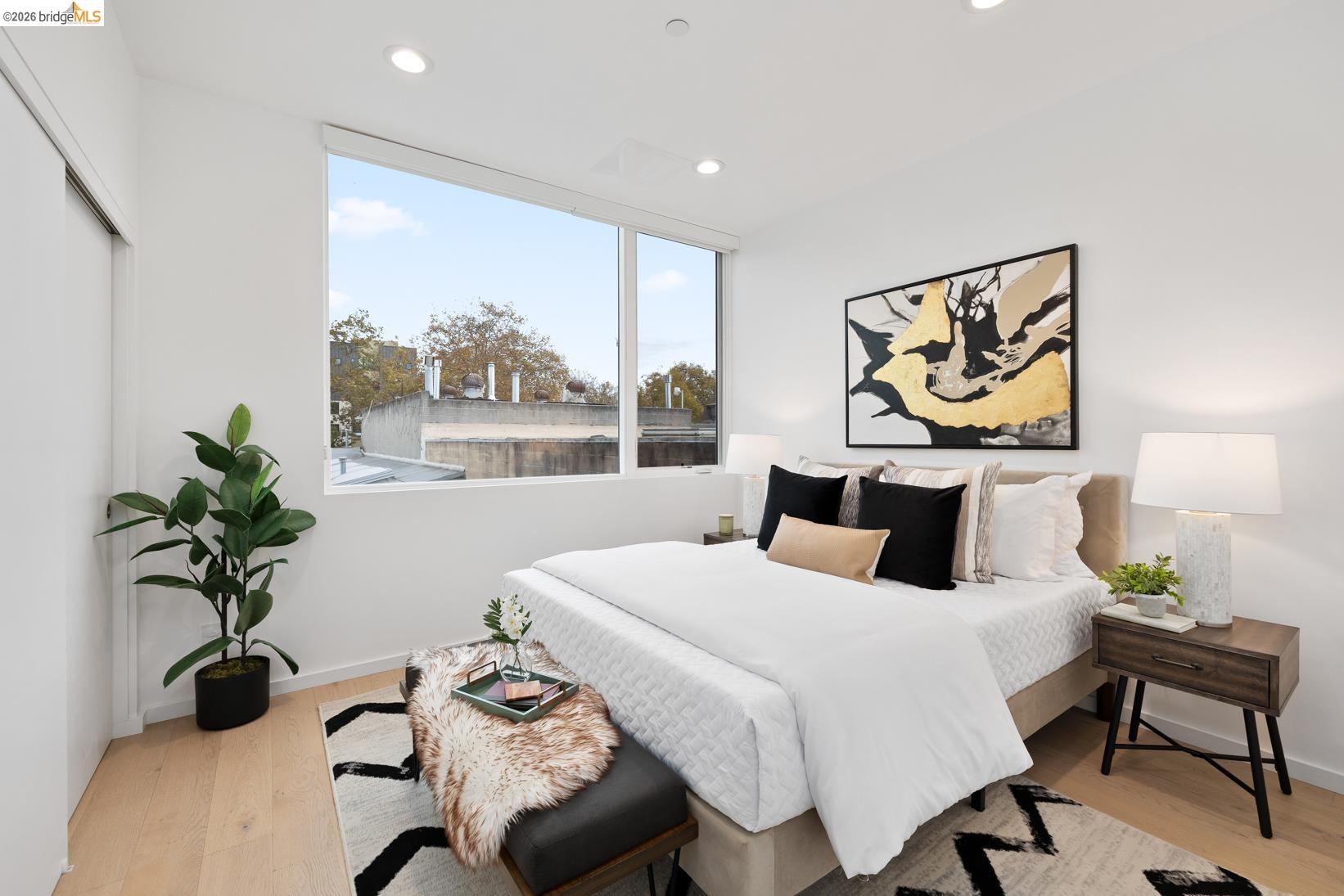 1034 Grayson Street Berkeley, CA 94710 - Photo 16 of 48 Bedroom with light wood finished floors and recessed lighting