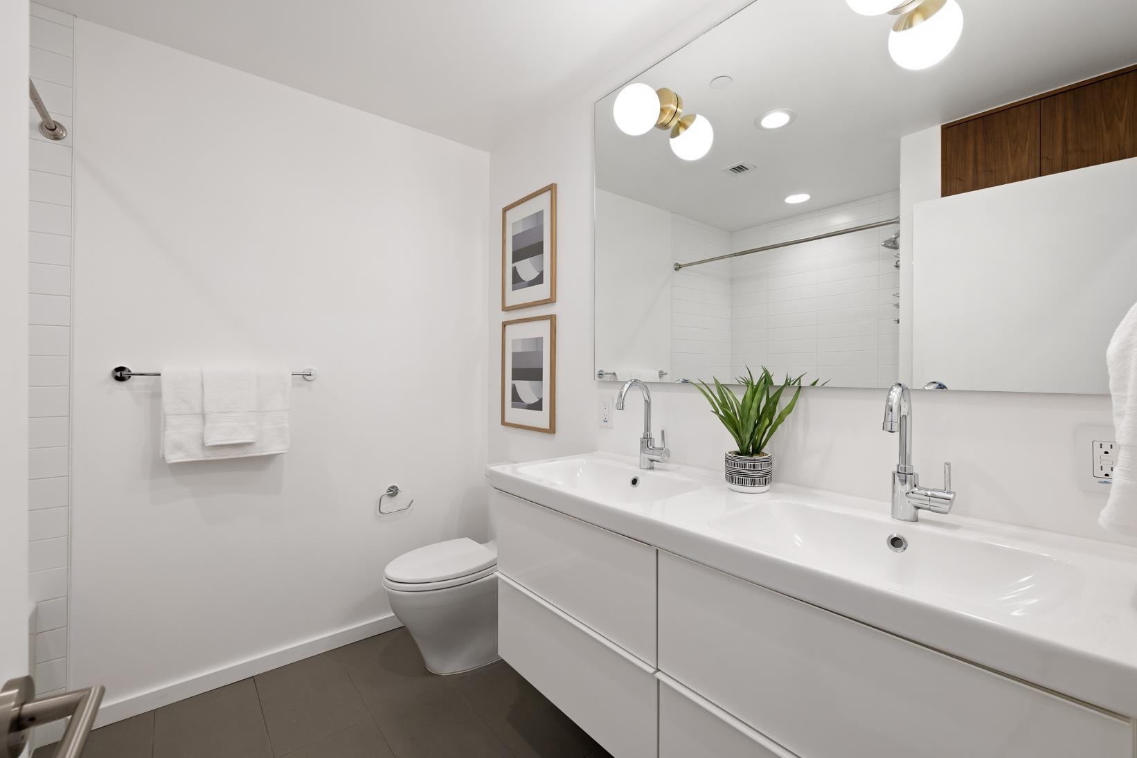 1034 Grayson Street Berkeley, CA 94710 - Photo 19 of 48 Full bathroom featuring double vanity, recessed lighting, and a shower