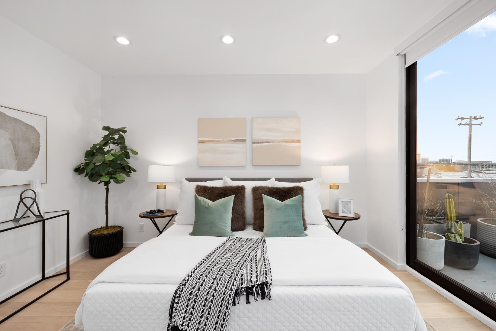 1034 Grayson Street Berkeley, CA 94710 - Photo 23 of 48 Bedroom featuring light wood finished floors, recessed lighting, and a wall of windows