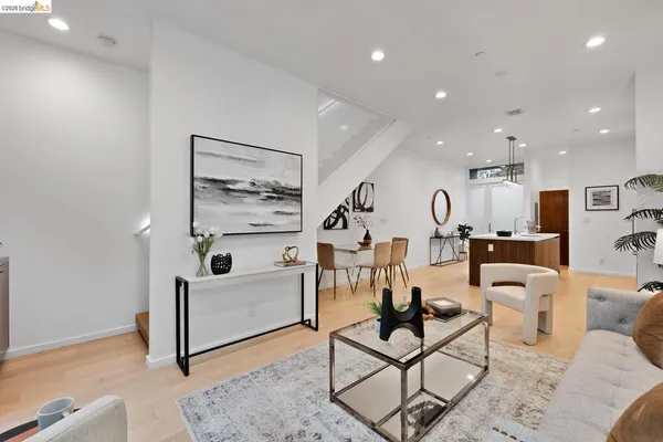 a outdoor space with a couch and chairs