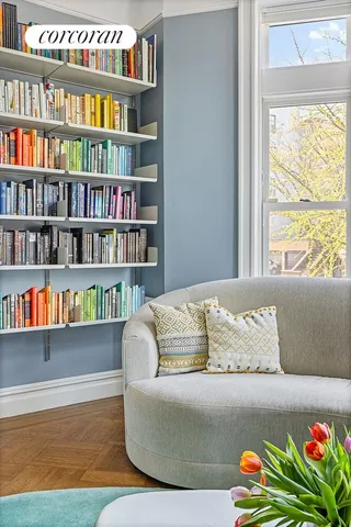 a picture of a bathroom with a street sign