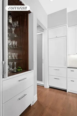 a kitchen with stainless steel appliances granite countertop a kitchen island a stove a table and chairs in it