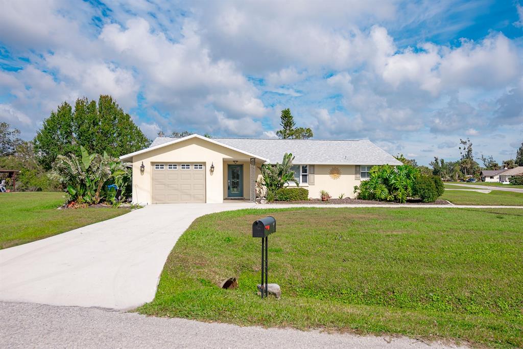 2545 Geneva Road Venice, FL 34293 - Photo 1 of 1 a front view of a house with a yard