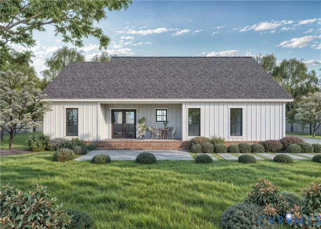 a front view of house with yard and green space