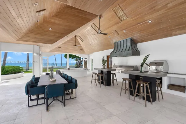 a dinning table and chairs in a room