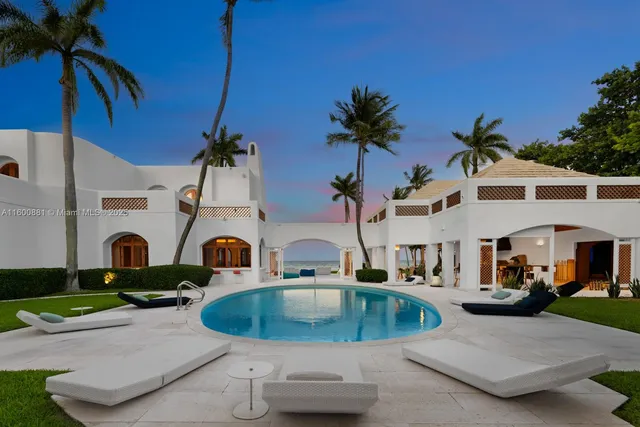 a view of a house with a swimming pool