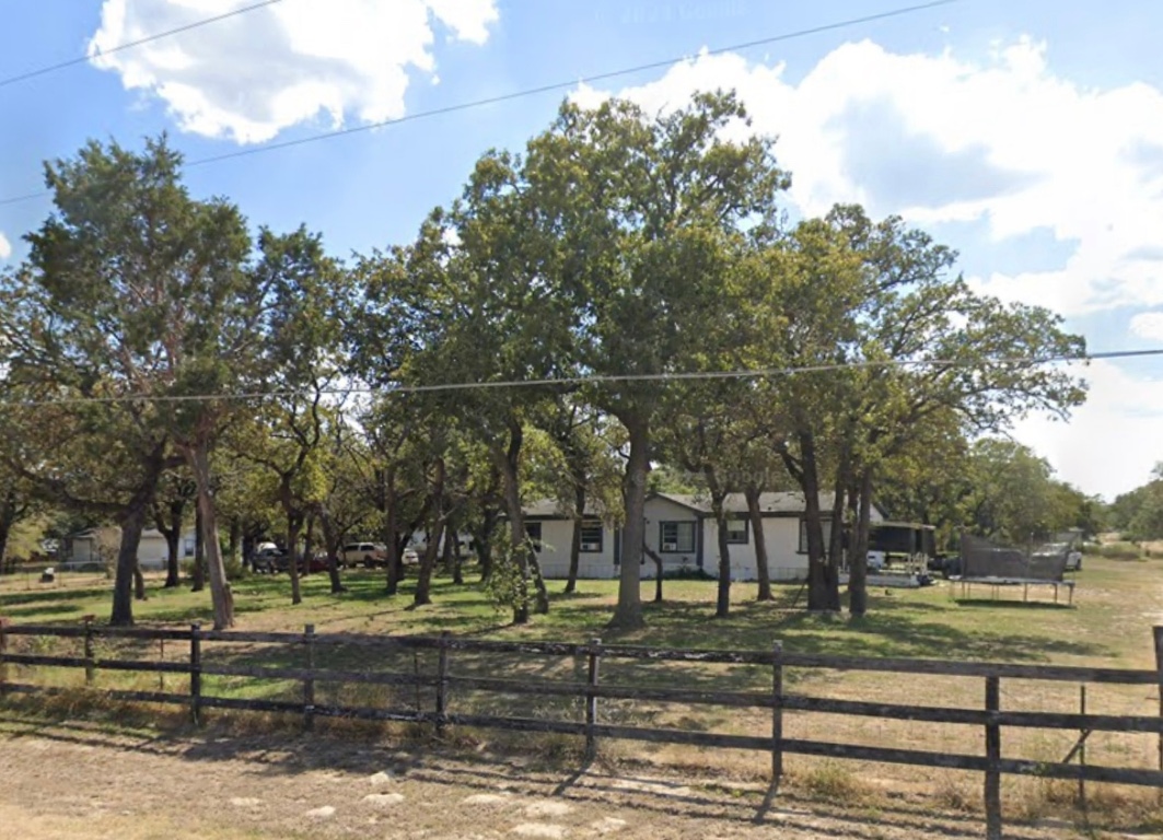 145 Sandy Lane Elgin, TX 78621 - Photo 1 of 1 a view of a park