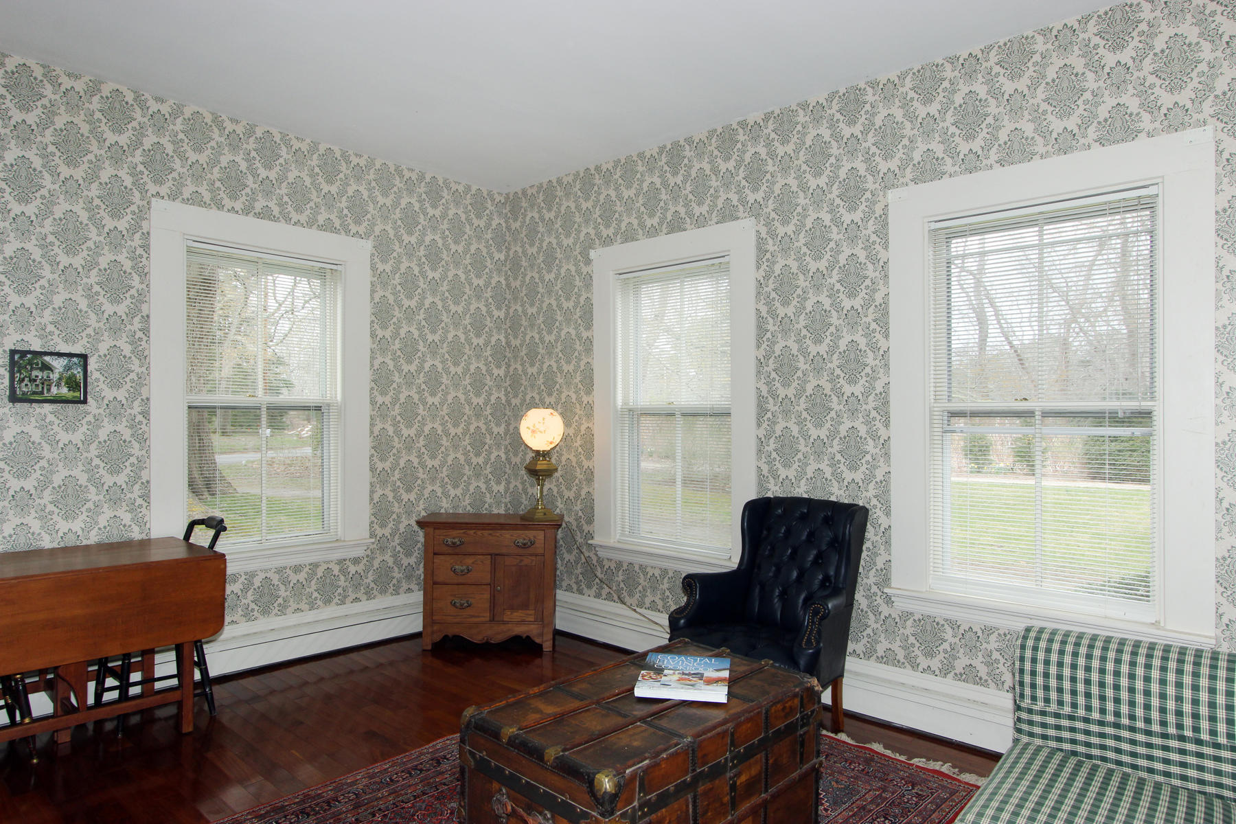 220 Locust Road Eastham, MA 02642 - Photo 20 of 50 a living room with furniture and a window