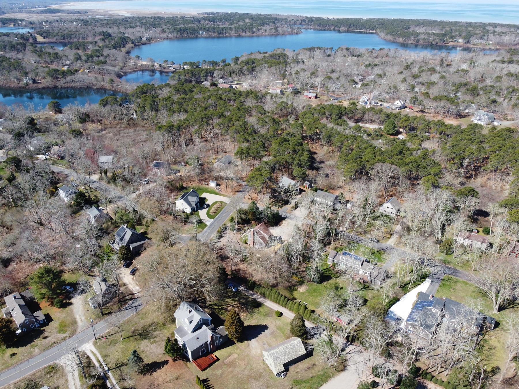 220 Locust Road Eastham, MA 02642 - Photo 48 of 50 an aerial view of a forest with houses