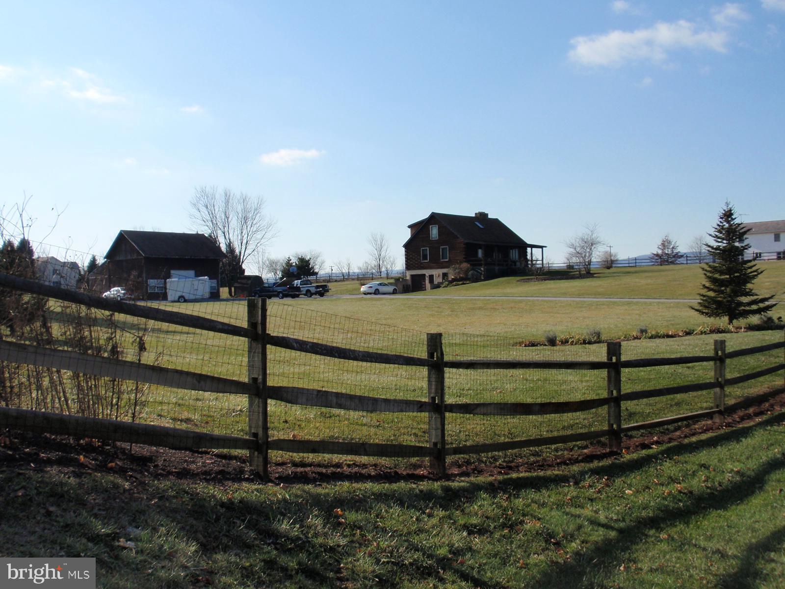 9013 Old Mill Road Rocky Ridge, MD 21778 - Photo 2 of 16 a view of a backyard