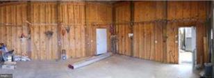 9013 Old Mill Road Rocky Ridge, MD 21778 - Photo 5 of 16 a view of a closet with wooden floor