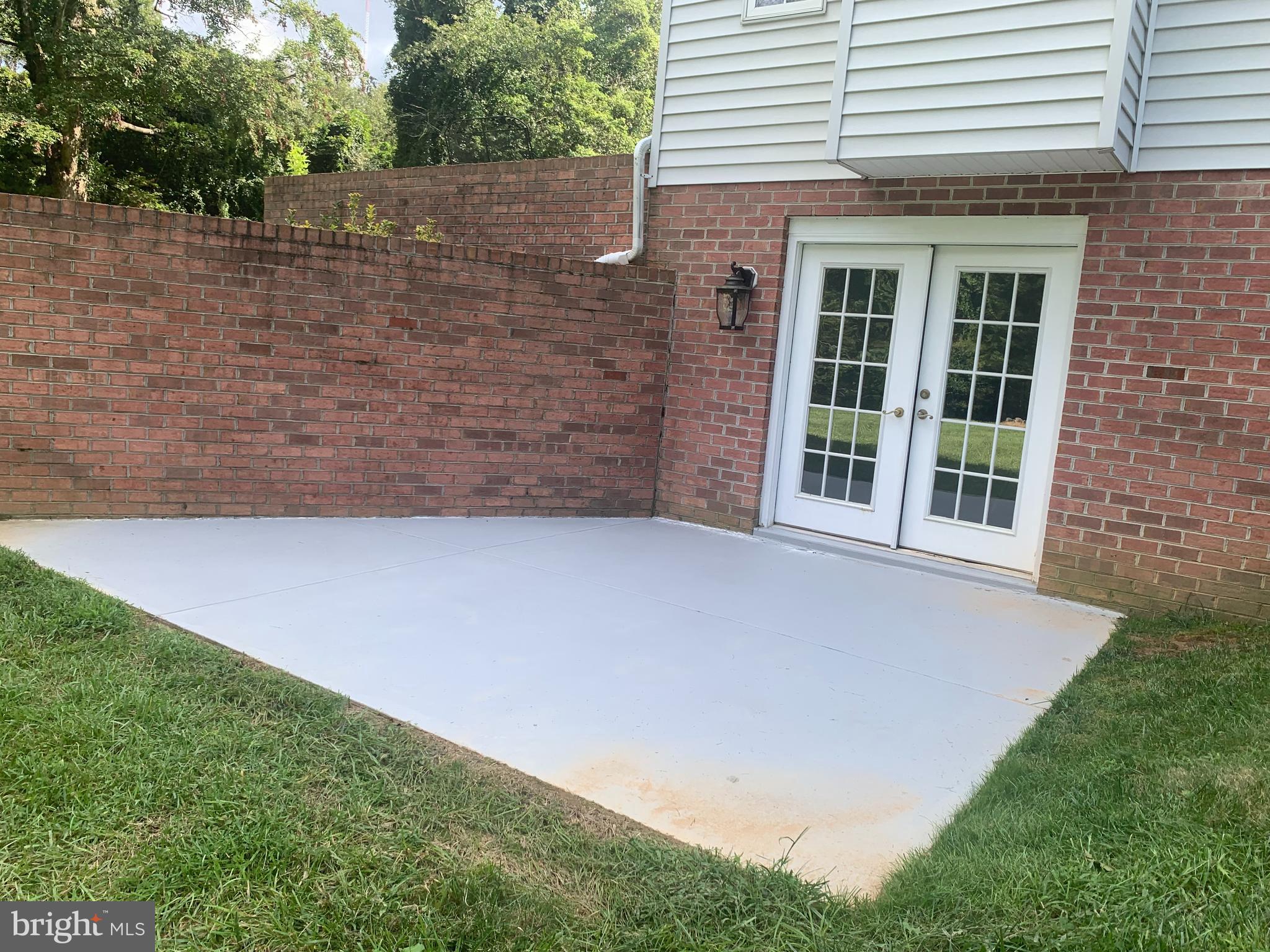 14215 Robcaste Road Phoenix, MD 21131 - Photo 38 of 51 Side patio with walk out from lower level