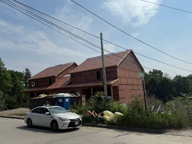 a car parked in front of a house