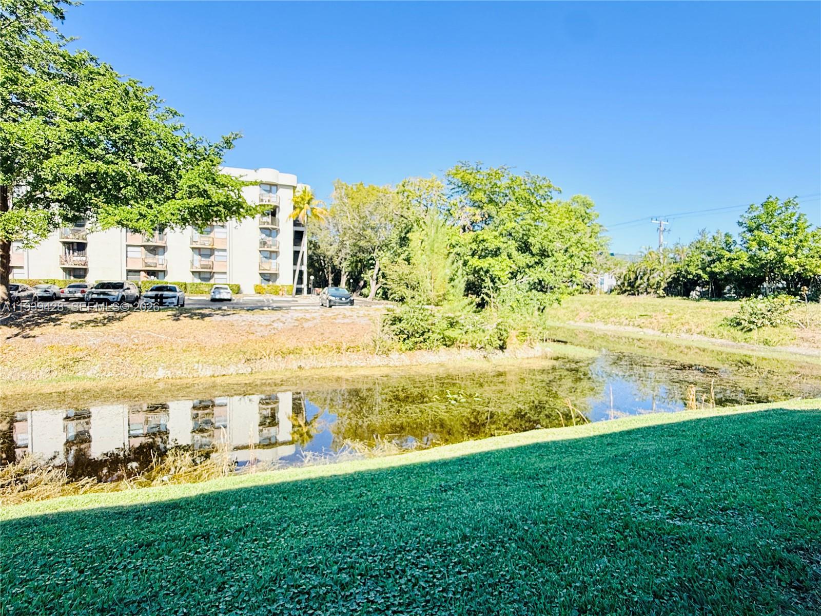 2651 Riverside Drive, Unit 3 Coral Springs, FL 33065 - Photo 20 of 29 a view of an ocean and a yard