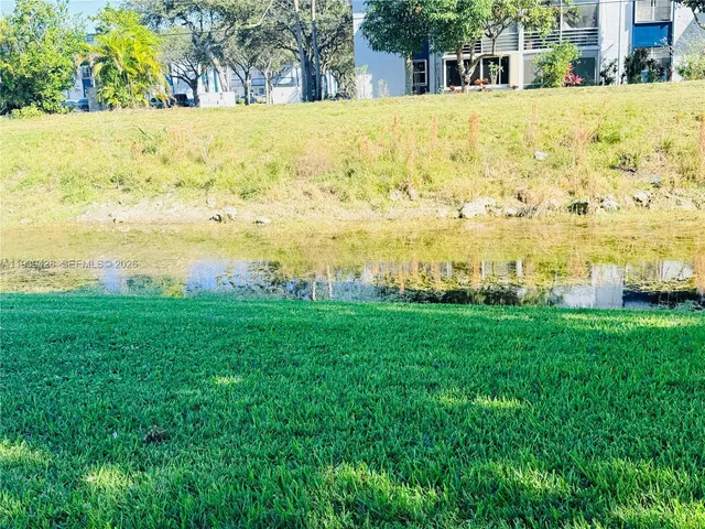 a view of swimming pool with chairs
