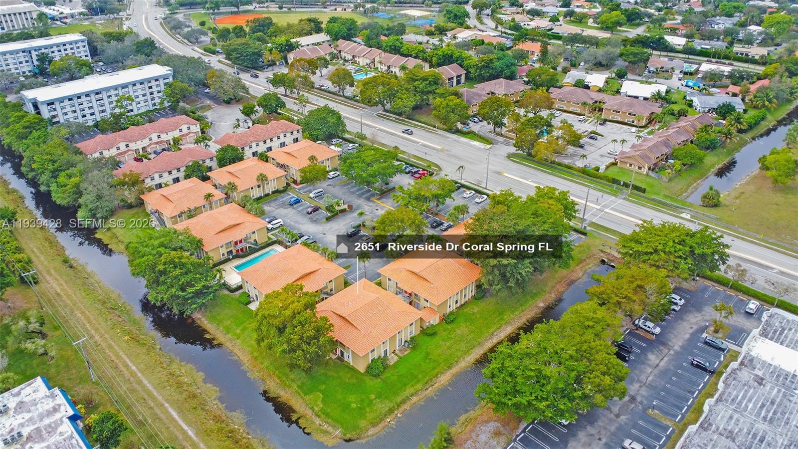 2651 Riverside Drive, Unit 3 Coral Springs, FL 33065 - Photo 26 of 29 an aerial view of a city