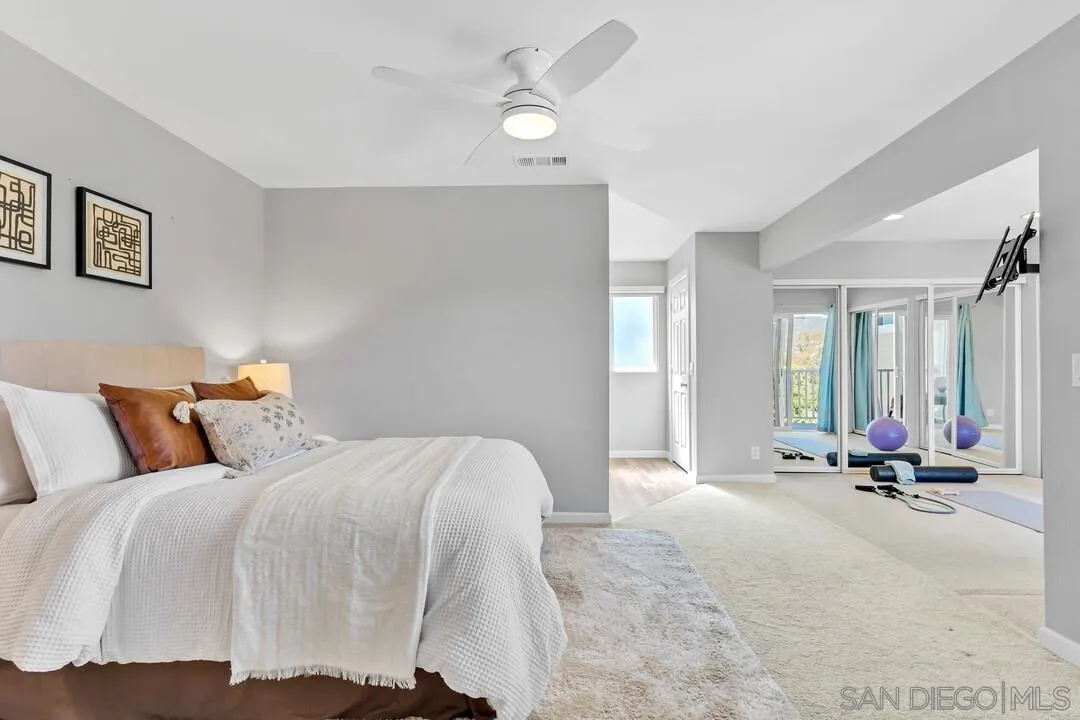 12232 Colony Drive Poway, CA 92064 - Photo 22 of 61 a bed room with a bed and with chair