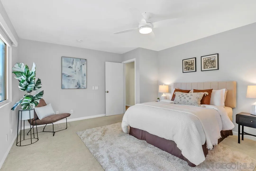 12232 Colony Drive Poway, CA 92064 - Photo 23 of 61 a bedroom with a bed and a painting on the wall