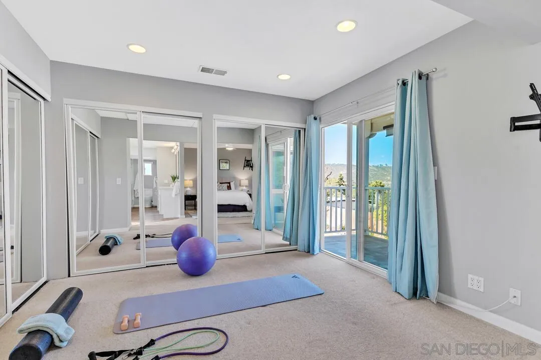 12232 Colony Drive Poway, CA 92064 - Photo 25 of 61 a room with furniture and a large window