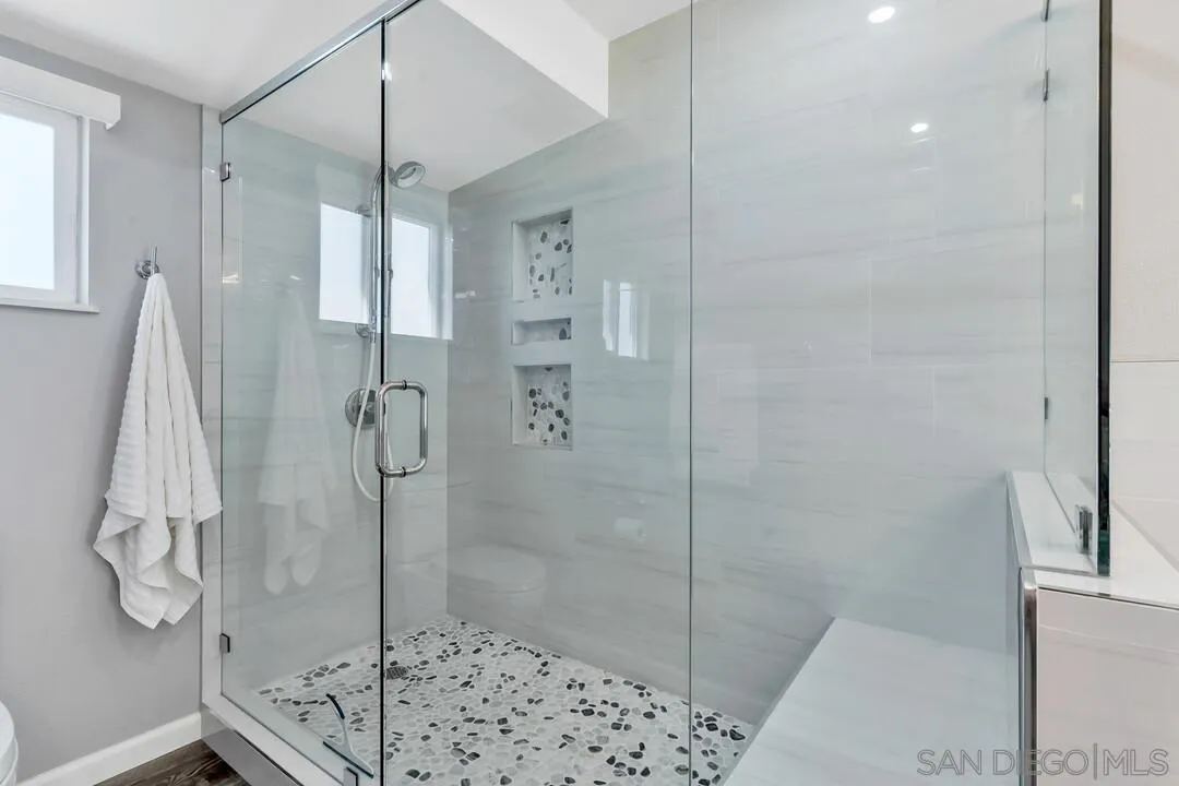 12232 Colony Drive Poway, CA 92064 - Photo 33 of 61 a bathroom with a shower and a sink