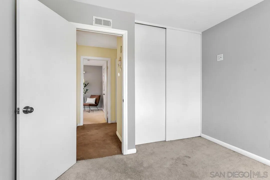 12232 Colony Drive Poway, CA 92064 - Photo 35 of 61 a view of a bathroom with a wardrobe space