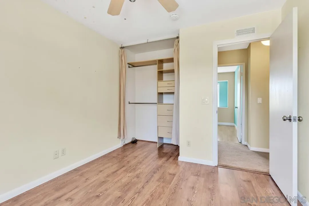 12232 Colony Drive Poway, CA 92064 - Photo 39 of 61 an empty room with wooden floor