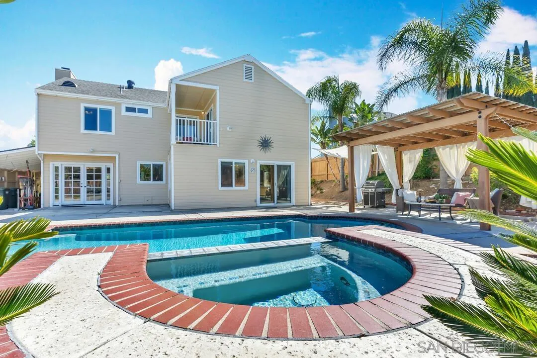 12232 Colony Drive Poway, CA 92064 - Photo 47 of 61 a view of a house with swimming pool and sitting area