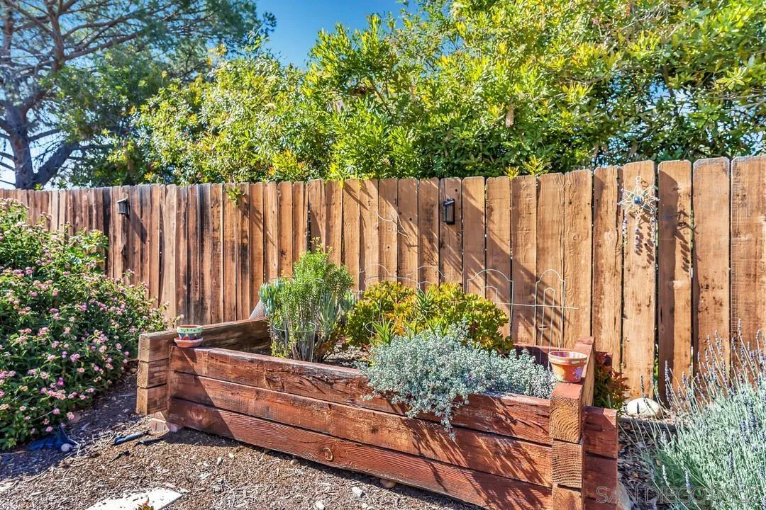 12232 Colony Drive Poway, CA 92064 - Photo 53 of 61 a wooden fence with some plants
