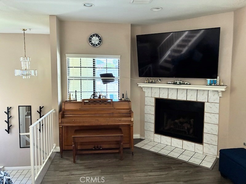 2249 Montrose Avenue, Unit 7 Montrose, CA 91020 - Photo 11 of 54 a living room with furniture a flat screen tv and a fireplace
