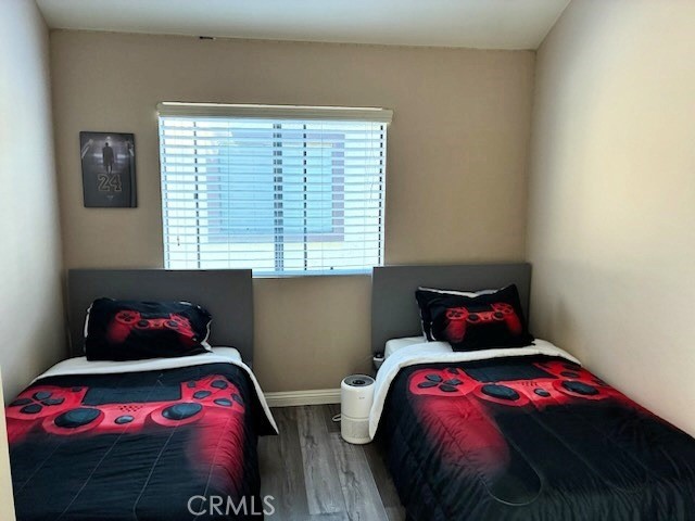 2249 Montrose Avenue, Unit 7 Montrose, CA 91020 - Photo 29 of 54 a bedroom with a bed a dresser and a window