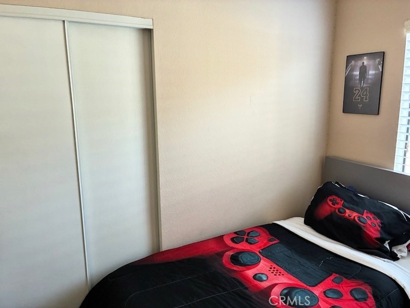 2249 Montrose Avenue, Unit 7 Montrose, CA 91020 - Photo 31 of 54 a bedroom with a bed and a dresser