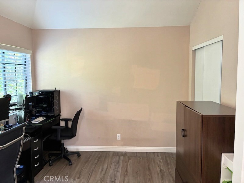 2249 Montrose Avenue, Unit 7 Montrose, CA 91020 - Photo 35 of 54 a view of a workspace with furniture and wooden floor