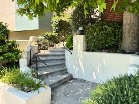 2249 Montrose Avenue, Unit 7 Montrose, CA 91020 - Photo 37 of 54 a view of a bench in backyard