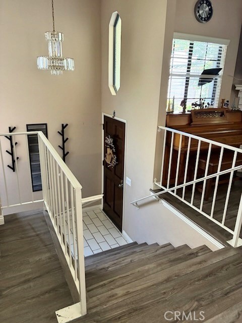 2249 Montrose Avenue, Unit 7 Montrose, CA 91020 - Photo 6 of 54 a view of a hallway with wooden floor and staircase